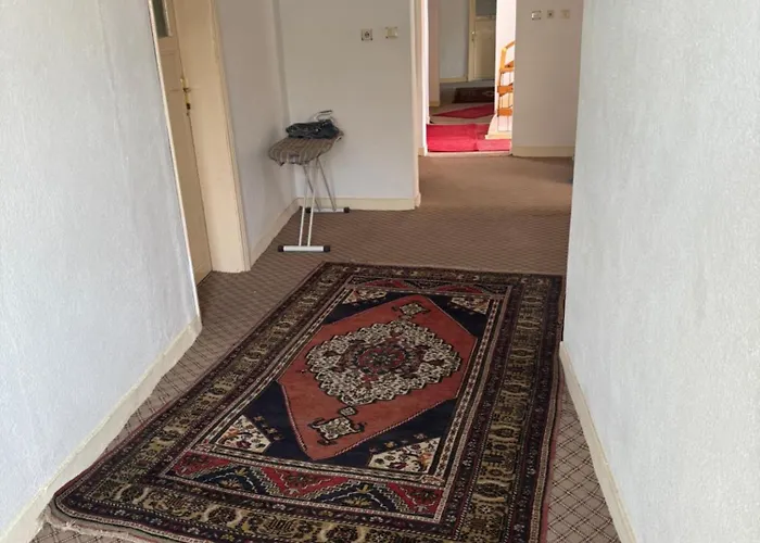 Отель Guemues *