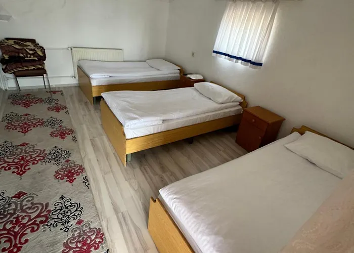 Отель Guemues *